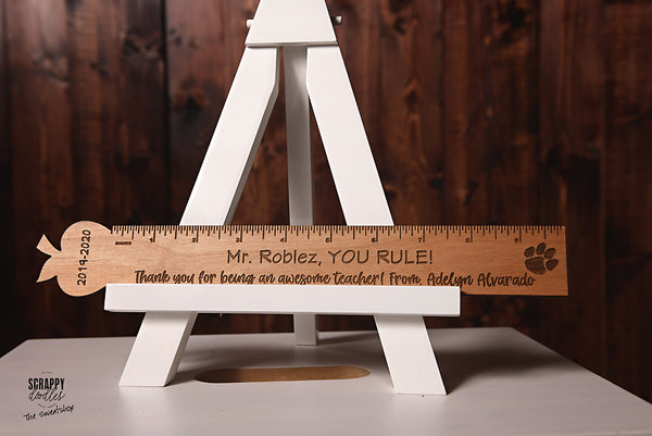 Large ruler with apple top
